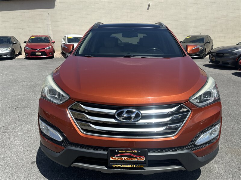 hyundai santa fe 2015 5XYZW4LA4FG293373 image hyundai santa fe 2015 5XYZW4LA4FG293373 image
